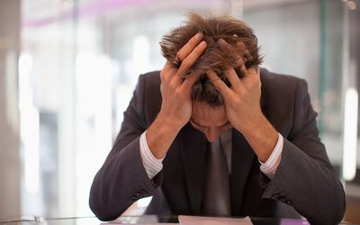 Man holding his head