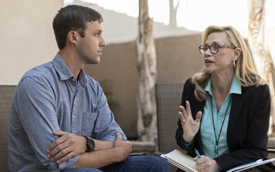Man talking with therapist specializing in eating disorder