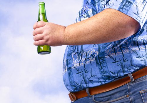 Obese Man With Beer