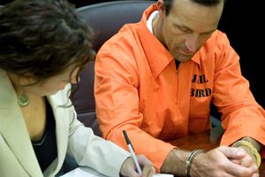 forensic psychologist talking to criminal