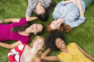 Women Laying in the Grass