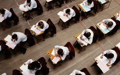 overhead view of students taking test