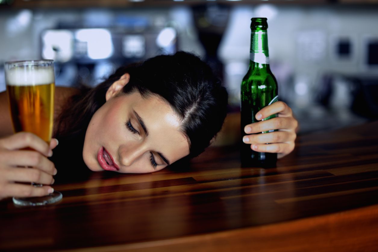 Woman Passed Out on Bar