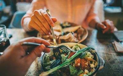 Eating food at restaurant