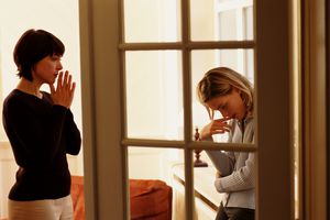 Mother talking to daughter
