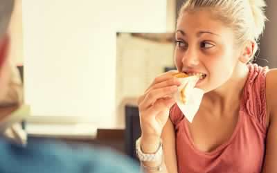 Woman eating a sandwich