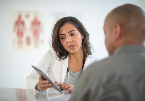 Female doctor counseling patient on anti-anxiety medications