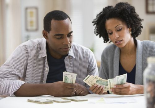 Couple counting cash