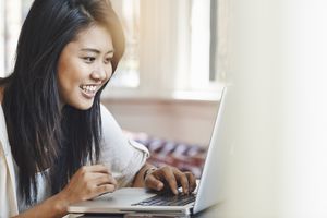 Student writing a critique paper