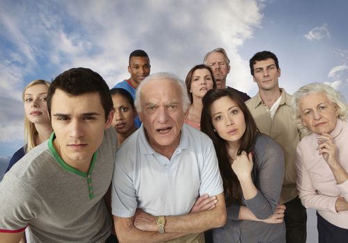 Group of people looking angrily at camera