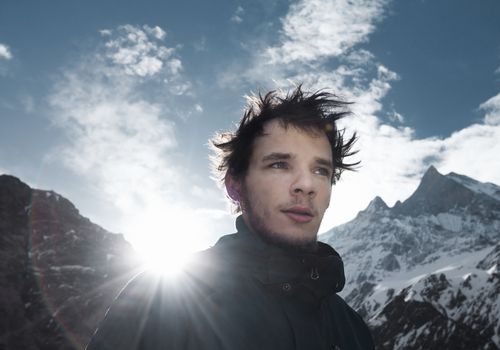 guy having an adventure on a mountain