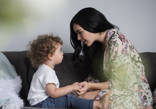 Woman talking to her son