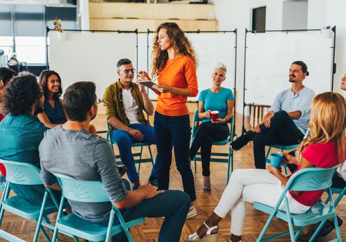 People in a circle in a meeting