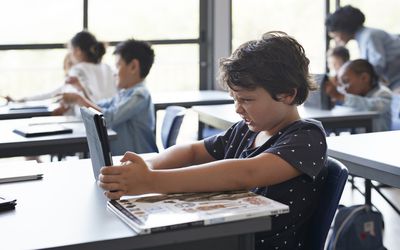 An angry boy at school