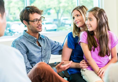 Happy family at guidance counseling