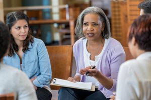 Psychologist talking to a group of women