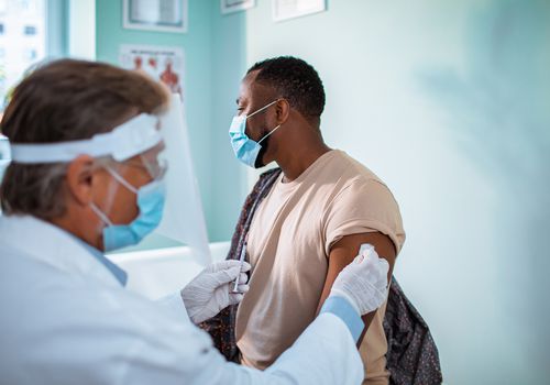 Black man taking part in a clinical trial