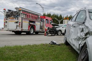 Two cars crashed in accident with firetruck behind