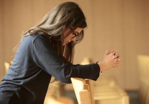 young woman praying