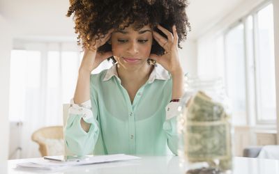 Stressed out mixed race woman