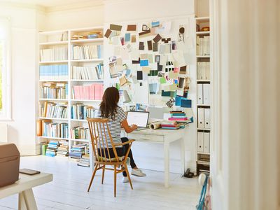 Pregnant woman working at home