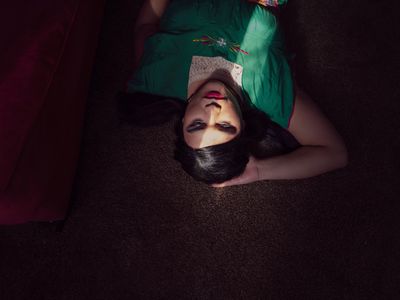 transgender woman with light shining across her face